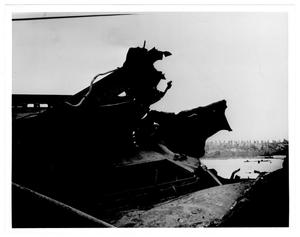 Primary view of object titled '[A ruined ship's hull near the port after the 1947 Texas City Disaster]'.