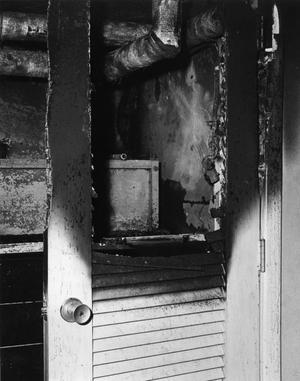 Primary view of object titled 'Aftermath of library fire, fire-damaged pipes.'.