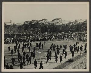Primary view of object titled '[Police Running Towards Crowd]'.