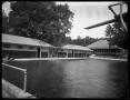 Photograph: [View of Unidentified Swimming Pool]