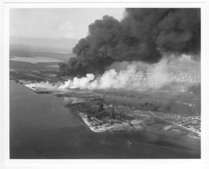 Primary view of object titled '[Aerial view of refinery structures, storage tanks, and port facilities after the 1947 Texas City Disaster]'.