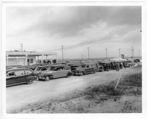 [Hearses waiting to be used after the 1947 Texas City Disaster]