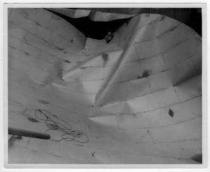 Primary view of object titled '[A damaged storage tank after the 1947 Texas City Disaster]'.