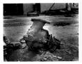 Photograph: [Large piece of metal debris after the 1947 Texas City Disaster]