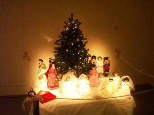 [Dolls Around Christmas Tree]
