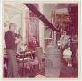 Thumbnail image of item number 1 in: '[John Hutton Speaking to a Group of Visitors in His Studio]'.