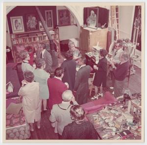 [Aerial View of John Hutton and Visitors in his Studio]