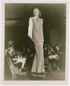 Primary view of object titled '[Model Wearing Vest and Slacks]'.
