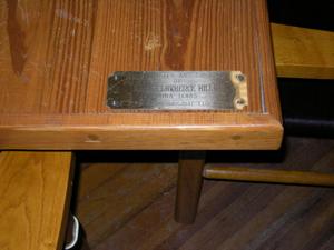[Plaque on Table]