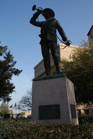 [Statue of a Man With Trumpet]