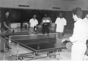 [Students play ping-pong in Moler Hall game room.]