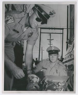 Primary view of object titled '[Abilene Police Officers Ray R. Young and William J. McKenzie]'.