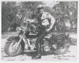 Photograph: [Abilene Police Officer Bryan Wason on a Motorcycle]