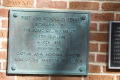 Thumbnail image of item number 1 in: '[Plaque on Brick Wall]'.
