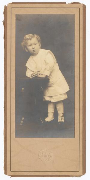 [Unknown Young Boy in Light Clothing]