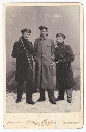 Primary view of object titled '[Karl Tostmann Standing in the Snow With Two Friends ]'.
