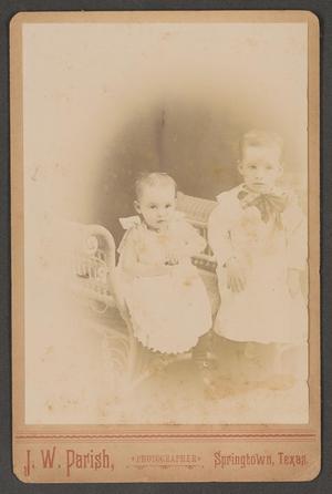 [Two Young Children in Light Color Clothing]