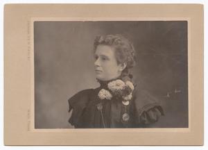 [Unknown Woman With Floral Bouquet Pinned to Her Clothing]