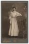 Thumbnail image of item number 1 in: '[Unknown Woman Wearing All Light Color Clothing]'.