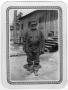 Thumbnail image of item number 1 in: '[ Man stands outside CCC camp buildings]'.