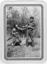 Photograph: [Two men posed in a mock fight]