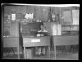 Thumbnail image of item number 1 in: '[Man sits at a desk]'.