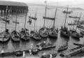 Photograph: [Sailboats and Smaller Boats in a Harbor]