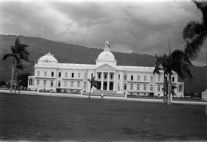 Primary view of object titled '[Public Building with Palm Trees]'.