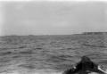 Photograph: [Harbor Viewed From a Boat]