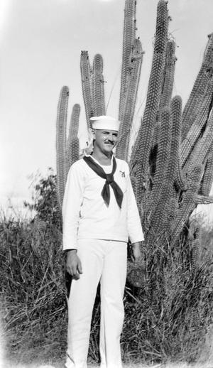 [Sailor in Front of Cactus]