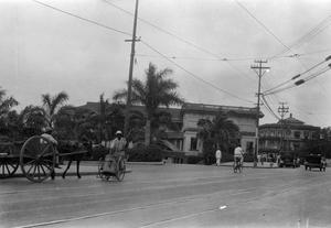 [Street Scene with Horse and Cart and a Man on a Bicycle]