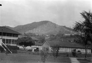 Primary view of object titled '[Buildings in Front of Hills]'.