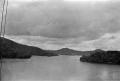 Thumbnail image of item number 1 in: '[Bay Framed by Mountains]'.