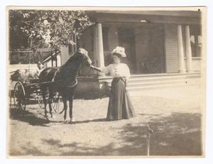 Primary view of object titled '[Photograph of Millicent Lupton Caldwell With Family Horse]'.