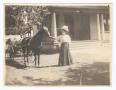 Photograph: [Photograph of Millicent Lupton Caldwell With Family Horse]