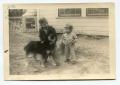 Primary view of [Aron Ellis Alexander and Martha Scott With Family Dog]