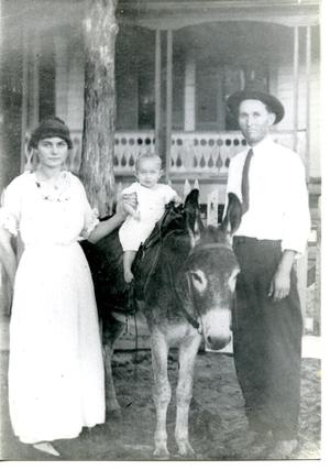 [Susie Lee Hyde Man, Percy Mann, and Child on Horseback]