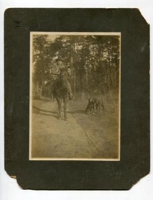 Primary view of object titled '[Jeff Morris Riding a Horse]'.