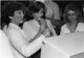 Primary view of [Great American smoke-out, nursing students Brenda Brasher and Linda Murphy check Betty Wells lung capacity.]