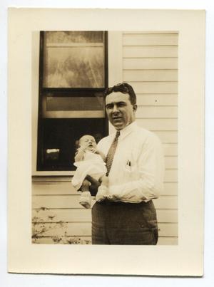 Primary view of object titled '[Man Holding His Daughter]'.