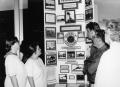 Photograph: [Lee College students and faculty view an Humble Oil exhibit]