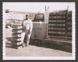 Photograph: [Coca-Cola Employee with Truck]