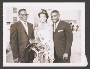 Primary view of object titled '[Miss KNOK 1964 With Two Men]'.
