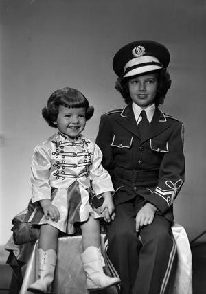 [Portrait of Two Children in Uniforms]