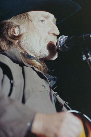 [Willie Nelson Singing Into a Microphone at South by Southwest]