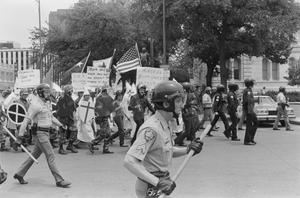 [Side View of KKK Members Walking in Rally]