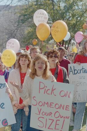 Primary view of object titled '[People Holding Signs and Balloons at Pro-Life Rally and March]'.