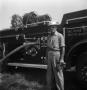 Thumbnail image of item number 1 in: '[Man in Front of Fire Engine]'.