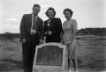 Photograph: [Three People with Seven Wells Historical Marker]