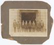 Photograph: [Seven Men in Front of Building]